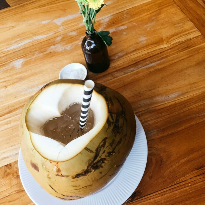 Photo by Markus Winkler coconut dessert with straw