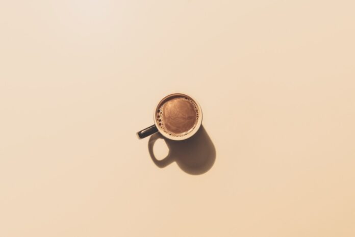Photo by Jakub Dziubak brown ceramic teacup
