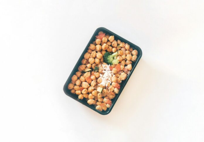 Photo by Rahul Chakraborty brown and white food in blue plastic container