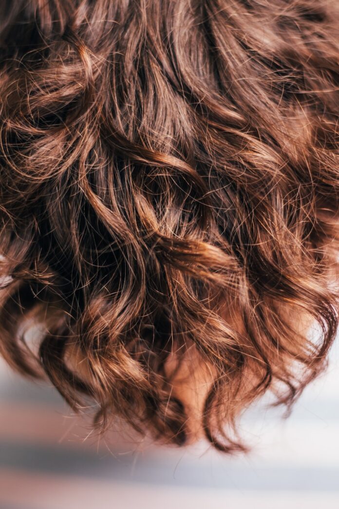 Photo by Paul Siewert black and brown hair