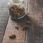 면역력의 보이지 않는 사령부, ‘마이크로바이옴’이 바꾸는 삶의 질 clear glass jar with brown coffee beans